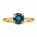 Pierścionek złoty 585 z naturalnym topazem London Blue 6 mm
